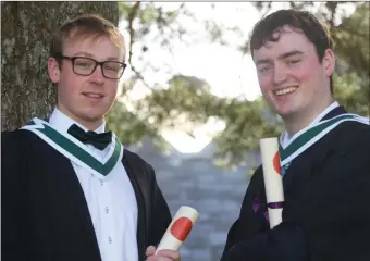  ??  ?? Pictured at NUI Galway’s Conferring Ceremony last week were Eoghan Heneghan from Strandhill and Mícheál Ó Fearraigh from Gaoth Dobhair, Co. Donegal, who were conferred with an honours Bachelor of Arts with Creative Writing.