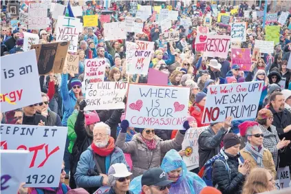  ?? MARLA BROSE/JOURNAL ?? Thousands gather on Civic Plaza for the Albuquerqu­e Women’s Rally, a sister rally of the Women’s March on Washington. The rallies and marches through the country and around the world on Saturday were in response to the inaugurati­on of President Donald...