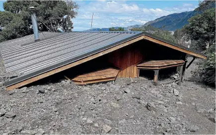  ?? SUPPLIED ?? David McIlroy’s home at Rosy Morn has been flooded and surrounded by gravel.