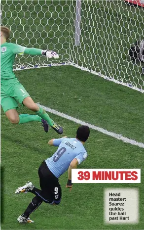  ??  ?? 39 MINUTES Head master: Suarez guides the ball past Hart