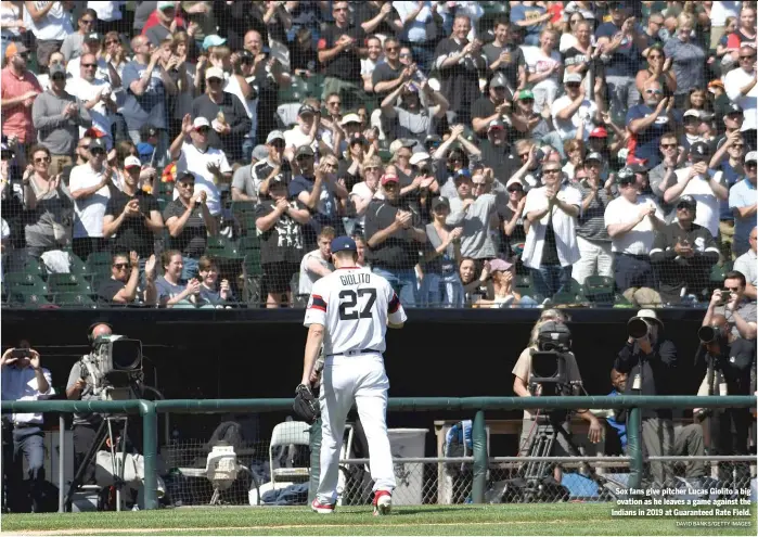  ?? DAVID BANKS/GETTY IMAGES ?? Sox fans give pitcher Lucas Giolito a big ovation as he leaves a game against the Indians in 2019 at Guaranteed Rate Field.