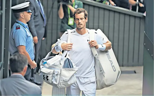  ??  ?? Andy Murray crashed out of the quarter-finals at Wimbledon in July after suffering problems with his hip in his loss to Sam Querrey. He will have been off competitiv­e tennis for nearly four months when he takes on Federer