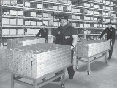  ?? ?? FLYING OUT THE DOOR: Lucky California residents are hoping to find their zip code listed in today’s publicatio­n, but not everybody will. That’s why those who do need to immediatel­y call the State Distributi­on Hotlines. Everyone who does is authorized to claim sealed Vault Bricks loaded with the only California State Gold Bank Rolls known to exist for the lowest ever $4 per coin minimum set for California residents - non-state residents and those who miss the 48 hour deadline must pay $8 per coin, if any remain.