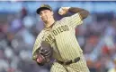  ?? ?? Padres starting pitcher Blake Snell pitches during the first inning against the Giants at Oracle Park.