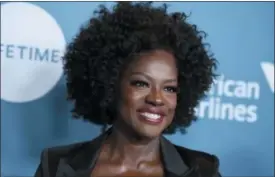  ?? PHOTO BY JORDAN STRAUSS — INVISION — AP ?? Viola Davis arrives at The Hollywood Reporter’s Women in Entertainm­ent Breakfast at Milk Studios on Wednesday in Los Angeles.