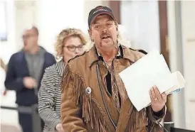  ?? THE OKLAHOMAN ?? In this 2018 photo, Joe Exotic files to run for governor of Oklahoma as a Libertaria­n candidate.