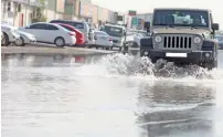  ??  ?? Puddles of water have formed on various roads, with motorists having to take extra care while driving through.