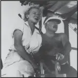  ??  ?? Hemingway enjoys a day on the sea with his fourth wife and widow, Mary Welsh.