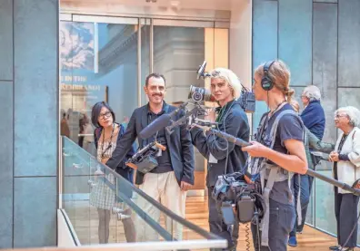  ?? CAREY KENY ?? At left, filmmakers Irene Kim Chin and Kurt Vincent are joined by the crew during the making of “Cactus Tree.”