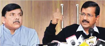  ?? PIC/MPOST ?? Chief Minister Arvind Kejriwal (right) along with AAP leader Sanjay Singh at a press conference in Delhi on Wednesday