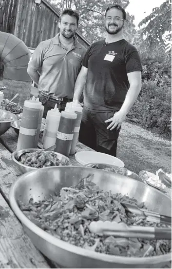  ?? [LIZ BEVAN / THE OBSERVER] ?? Logan Martin of Martin’s Family Fruit Farms and Jason Hanoski, chef at Timeless Cafe in Waterloo, are teaming up to bring creative dishes made with local food to the Taste Local! Taste Fresh! event later this month.