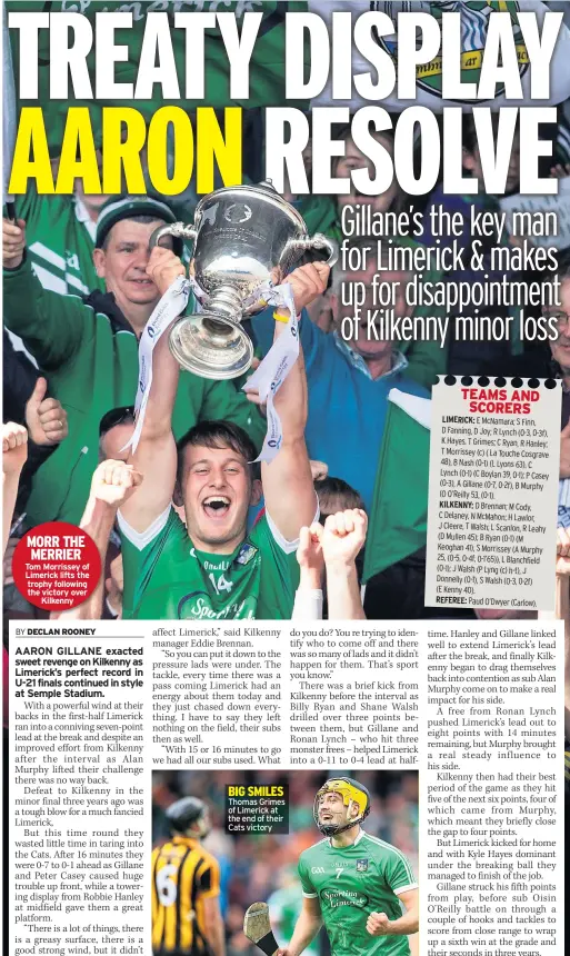  ??  ?? MORR THE MERRIER Tom Morrissey of Limerick lifts the trophy following the victory over Kilkenny Thomas Grimes of Limerick at the end of their Cats victory