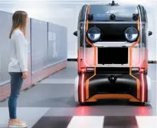  ?? CITIZEN NEWS SERVICE PHOTO ?? To create trust between pedestrian­s and self-driving vehicles, Jaguar Land Rover has developed a driverless pod with eyes that signal the vehicle’s intent to human observers.