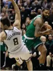  ?? AP PHOTO ?? ROAD BLOCK: Marcus Morris runs into the Bucks’ Matthew Delladova during the Celtics’ loss in Game 6 last night.