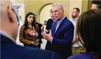  ?? Patrick Semansky/Associated Press ?? Speaker of the House Kevin McCarthy, R-Calif., speaks with members of the press after a phone call on the debt ceiling with President Joe Biden, Sunday on Capitol Hill in Washington.