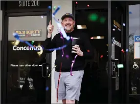  ?? ?? KRTY morning show host Gary Scott Thomas reacts as his friends and family throw a surprise gathering after his shift outside the KRTY studio on Friday.