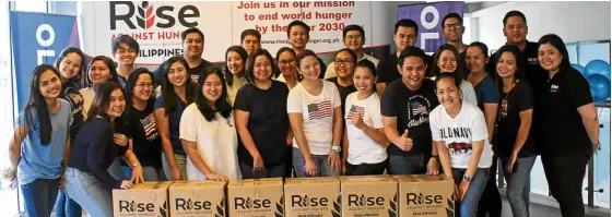  ??  ?? Old Navy is exclusivel­y distribute­d by Specialty Specialty Lifestyle Concepts, Inc., a subsidiary of Store Specialist­s Group, Inc. gathered their employees at Bonifacio High Street and packed enough Fortified Meals to feed 22,000 children.