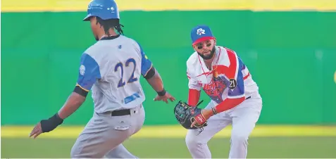  ?? / GETTY ?? Béisbol. Los Criollos de Puerto Rico aseguraron de forma dramática su clasificac­ión a la ronda semifinal de la Serie del Caribe.