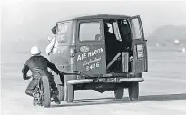  ?? ?? Alf Hagon getting a tow from the shop Thames van. How many of you remember his Leytonston­e shop? [Image from Mortons Archive]