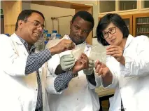  ??  ?? Associate Professor Azam Ali, left, Stephen Giteru, and Professor Indrawati Oey say the hunt for biodegrada­ble and edible packaging is ‘‘a global priority’’.