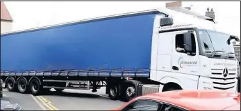  ??  ?? Left; The lorry turned into Mill Hill Road from Trinity Lane; below top and middle, the driver reverses back out on to Mansion Street; bottom, he rejoins Mansion Street to turn left onto Bond Street