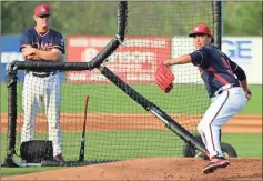  ?? Jeremy Stewart / RN-T ?? Rome Braves pitcher Oldavi Javier (right) throws during a workout earlier this week at State Mutual Stadium while pitching coach Dan Meyer watches.