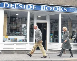  ?? Pictures: HEMEDIA/PA. ?? The Duke and Duchess of Rothesay visit Deeside Books to see how it has recovered after the floods of 2015, below.