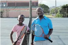  ?? Picture: MARK CARRELS ?? PROMISING CAREERS: Boyce Xamesi and his son, Qiqa, 10, during an afternoon of training at the Port Alfred Tennis Club courts.