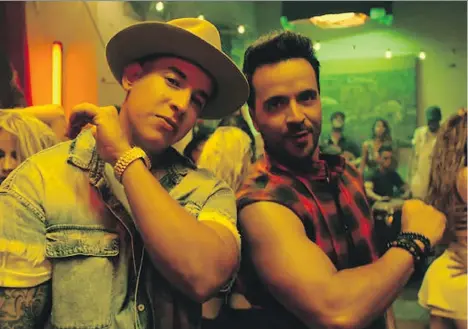  ??  ?? Latin music is hitting all the high notes as a result of early digital adoption by fans. The mega-hit Despacito by Daddy Yankee, left, and Luis Fonsi helped catapult Latin music into the mainstream and onto the radio. The video recently surpassed five...