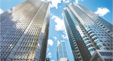  ?? Peter J. Thompson / financial post files ?? Bank towers in Toronto’s financial district. With job losses and the deteriorat­ion of the
Canadian economy due to COVID-19, analysts foresee consumer insolvenci­es rising.