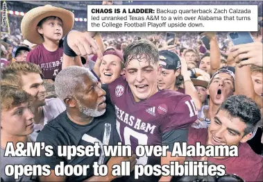  ?? ?? CHAOS IS A LADDER: Backup quarterbac­k Zach Calzada led unranked Texas A&M to a win over Alabama that turns the College Football Playoff upside down.