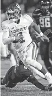  ?? Brad Tollefson / Associated Press ?? Oklahoma quarterbac­k Kyler Murray is sixth in the nation with 2,689 passing yards.