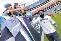  ?? MARK ZALESKI/AP FILE PHOTO ?? Tennessee’s Delanie Walker said he and his family have received death threats since he told fans not to come to games if they felt disrespect­ed by players’ protests.