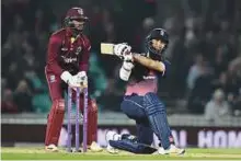  ?? AFP ?? England’s Moeen Ali hits a six during the fourth One Day Internatio­nal against the West Indies at the Oval in London on Wednesday.