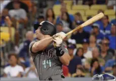  ?? MARK J. TERRILL - THE ASSOCIATED PRESS ?? In this Aug. 31 photo Diamondbac­ks’ Paul Goldschmid­t hits a two-run home run during game against Dodgers in Los Angeles. The St. Louis Cardinals have acquired Goldschmid­t from the Diamondbac­ks in a multiplaye­r trade.