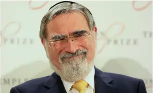  ?? (Paul Hackett/Reuters) ?? RABBI JONATHAN SACKS: ‘Judaism is the systematic rejection of tragedy in the name of hope.’