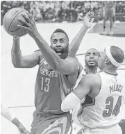  ?? Mark J. Terrill / Associated Press ?? James Harden encounters Paul Pierce (34) as the last line of defense for the Clippers.