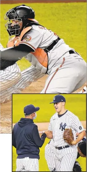  ?? AP ?? Aaron Boone takes the ball from Jameson Taillon during the fifth inning of Yankees’ loss to Orioles on Wednesday night at Stadium.