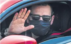  ?? AFP ?? Juventus defender Leonardo Bonucci gestures as he arrives in his car at the club’s Continassa training ground in Turin.