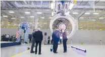  ?? COURANTFIL­E PHOTO ?? Jet engine manufactur­er Pratt & Whitney, reeling from the recent economic downturn, said Tuesday it will lay off salaried workers.