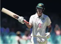  ?? PHOTO: REUTERS ?? Milestone marked . . . Australia batsman Cameron Green salutes the crowd after bringing up his halfcentur­y on the fourth day of the third test at the SCG yesterday.