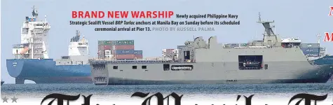  ?? PHOTO BY RUSSELL PALMA ?? BRAND NEW WARSHIP Newly acquired Philippine Navy Strategic Sealift Vessel BRP Tarlac anchors at Manila Bay on Sunday before its scheduled ceremonial arrival at Pier 13.