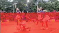  ?? ?? Some areas, such as Danzhou in Hainan, add zest to rural games with a squad of cheerleade­rs.