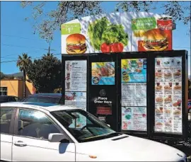  ?? Justin Sullivan Getty Images ?? A McDONALD’S executive said the company could use license plate recognitio­n to personaliz­e smart menus. Starbucks started trying it in South Korea last year.