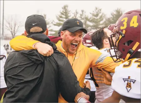  ?? David G. Whitham / For Hearst Connecticu­t Media ?? Sheehan coach John Ferrazzi celebrates as the final seconds expire against Bloomfield in the Class S state final in 2019.