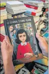  ?? Picture: AFP ?? NEW READ: A French copy of the graphic novel version of ‘The Diary of Anne Frank’