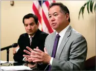  ?? AP PHOTO BY RICH PEDRONCELL­I ?? In this 2017 file photo, Assemblyma­n Phil Ting, D-san Francisco, right, discusses the state budget next to Assembly Speaker Anthony Rendon, D-paramount, in Sacramento.