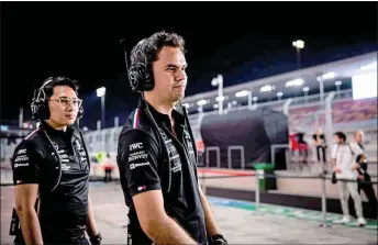  ?? — Bernama photo ?? Wan Mohd Saifullah (left) and Emil are tasked with analysing fuel and lubricant oils for MercedesAM­G Petronas F1 racing cars before and after each race.