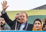  ?? ?? LAHORE: Former Prime Minister Nawaz Sharif (center) along with his daughter Maryam Nawaz (right) wave to supporters during an election campaign rally on January 29, 2024. — AFP