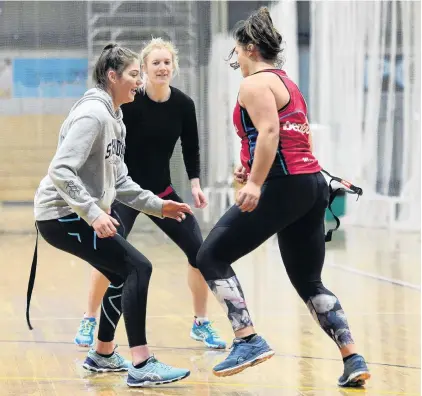  ?? PHOTO: LINDA ROBERTSON ?? Southern Steel players (from left) Georgia Heffernan, Shannon Francois and Olivia Bates take part in a drill during a team training session at the Edgar Centre in Dunedin yesterday.